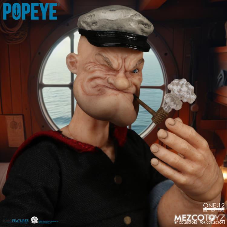 The One:12 Collective Popeye figure includes two masterfully crafted head portraits: a stern stare and a salty glare. Authentically presented in his classic sailor clothing and a removable pea coat, Popeye comes complete with a wide range of accessories including: a functional drawstring duffle bag, a collapsible spy glass, a compass with hinged lid, two spinach cans, three different hats, and two styles of corncob pipes.