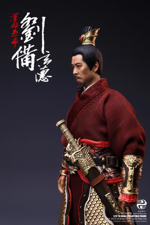 Crush the invading enemies as you defend your homeland with this Liu Bei Xuande figure by 303 Toys! Featuring multiple weapons and accessories, this 1/12 scale figure will be a perfect addition for any collector. Order yours today! The Battlefield Version of this figure includes a war banner and horse for your warrior to ride on.
