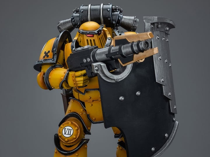 The Warhammer 40K Imperial Fists “The Horus Heresy” product line offers a compelling collection of figures capturing the essence of the Imperial Fists Space Marine Legion during the pivotal era of “The Horus Heresy.” Meticulously crafted and intricately detailed, these action figures showcase the iconic yellow and black color scheme of the Imperial Fists, symbolizing their stoic determination and unwavering loyalty to the Imperium of Man.