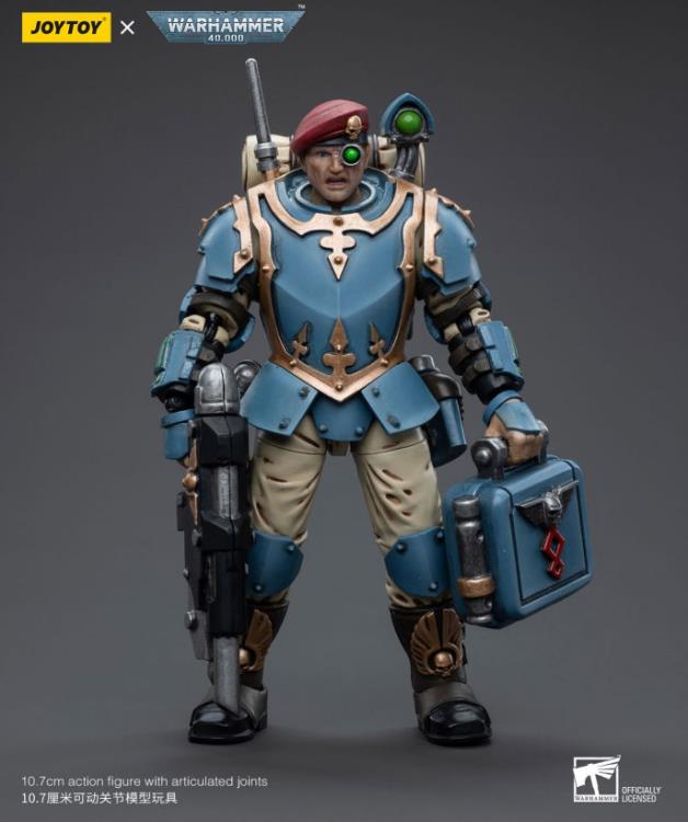 This is a 1/18 scale highly detailed, articulated figure based on Warhammer 40k's Tempestus Scion of the Astra Militarum Tempestus 55th Kappic Eagles. The Tempestus Scion figure stands about 4.20 inches tall and comes with several interchangeable parts and accessories, opening the door to a plethora of different and unique display opportunities.