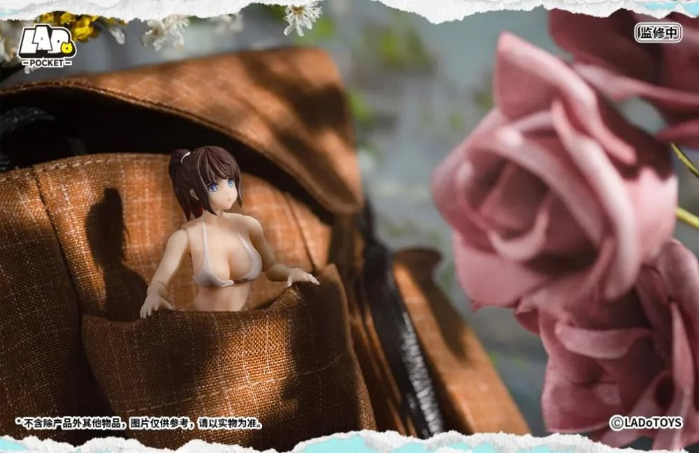 From LADo Toys comes the original character Swimsuit Girl as part of the Pocket Girl action figure line! This pocket sized figure, standing around 4 inches in height, displays a girl wearing a white swimsuit with multiple points of articulation for creating a variety of fun poses. Don't miss your chance to add it to your collection!