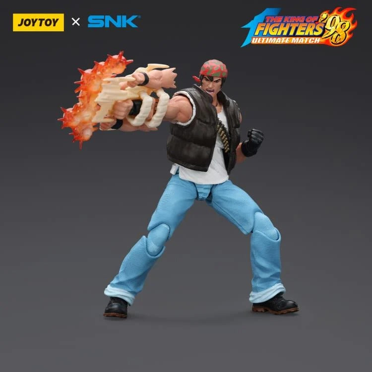 A new fighter is approaching! From the legendary fighting game The King of Fighters '98: Ultimate Match comes the next challenger in 1/18 scale: Ralf Jones! Dressed in his traditional biker outfit, Ralf comes with a large variety of accessories including effect pieces when he executes a powerful move. Recreated with outstanding detail lifted directly from the game, you'll be able to re-enact your favorite brawls or envision your own high stakes fights in style!