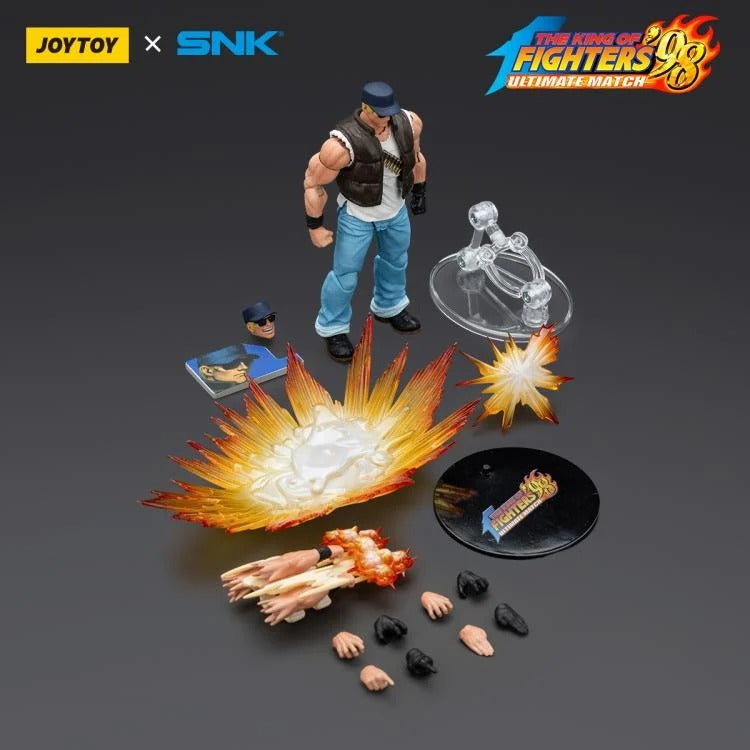 A new fighter is approaching! From the legendary fighting game The King of Fighters '98: Ultimate Match comes the next challenger in 1/18 scale: Clark Still! Dressed in his traditional black and white outfit, Clark comes with a large variety of accessories including effect pieces when he executes a powerful move. Recreated with outstanding detail lifted directly from the game, you'll be able to re-enact your favorite brawls or envision your own high stakes fights in style!