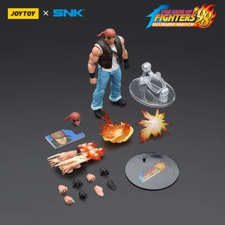 A new fighter is approaching! From the legendary fighting game The King of Fighters '98: Ultimate Match comes the next challenger in 1/18 scale: Ralf Jones! Dressed in his traditional biker outfit, Ralf comes with a large variety of accessories including effect pieces when he executes a powerful move. Recreated with outstanding detail lifted directly from the game, you'll be able to re-enact your favorite brawls or envision your own high stakes fights in style!