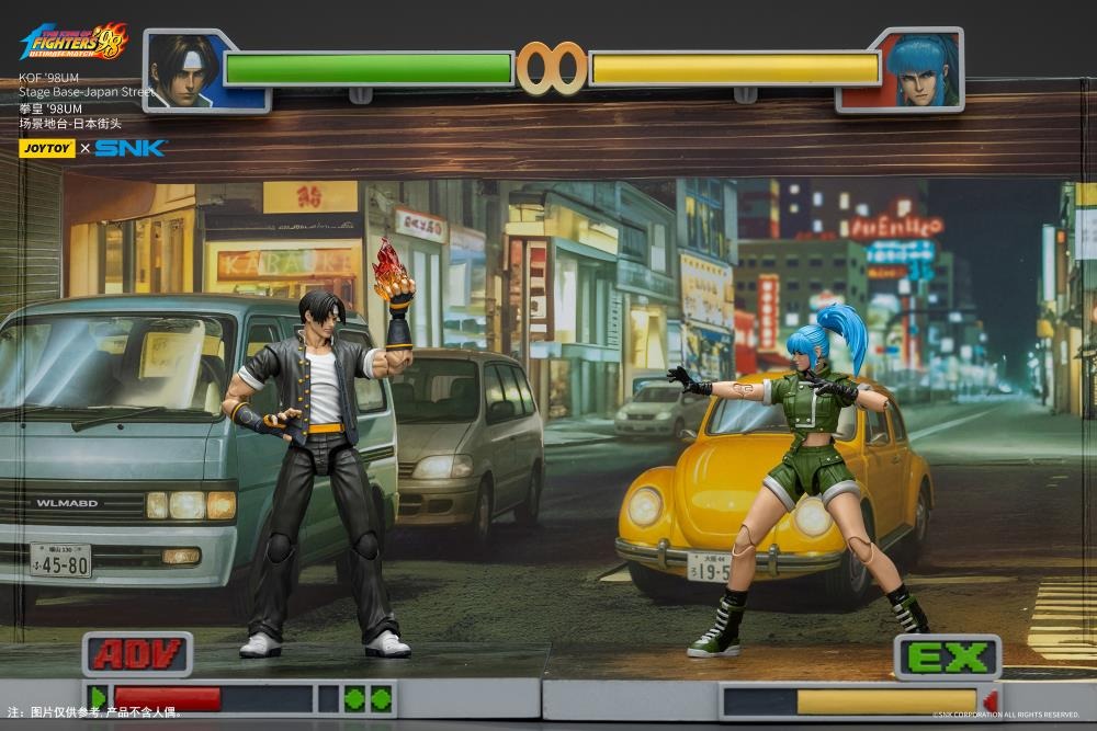 A new fighter is approaching! From the legendary fighting game The King of Fighters '98: Ultimate Match comes a new way to display your favorite heroes and villains duking it out for prizes and glory: the Japan Stage! A diorama base that showcases a busy night street in the middle of a Japanese city, this stage features impressive detailing lifted directly from the game! Get ready for the next round when you order your diorama base today!