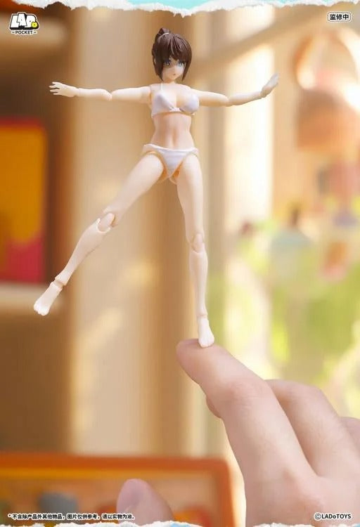 From LADo Toys comes the original character Swimsuit Girl as part of the Pocket Girl action figure line! This pocket sized figure, standing around 4 inches in height, displays a girl wearing a white swimsuit with multiple points of articulation for creating a variety of fun poses. Don't miss your chance to add it to your collection!