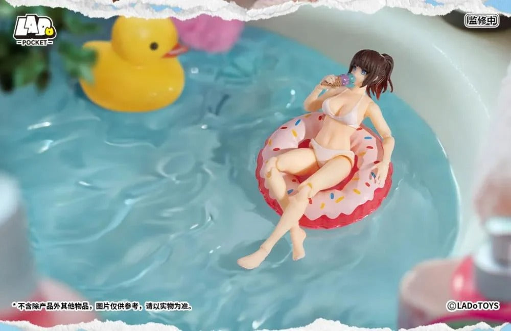 From LADo Toys comes the original character Swimsuit Girl as part of the Pocket Girl action figure line! This pocket sized figure, standing around 4 inches in height, displays a girl wearing a white swimsuit with multiple points of articulation for creating a variety of fun poses. Don't miss your chance to add it to your collection!