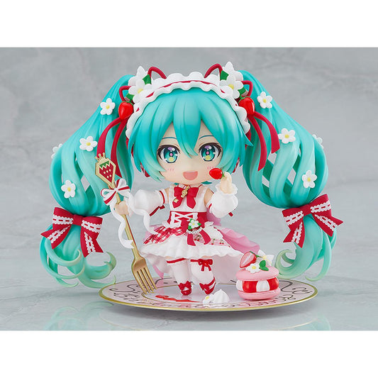 Good Smile Company GSC Hatsune Miku appears in a brand new strawberry motif outfit. The 15th Anniversary Figure Project illustration by En Morikura has been transformed into a Nendoroid! Miku's gorgeous outfit adorned with strawberries and frills and her twintail hairstyle have been faithfully captured in Nendoroid form.