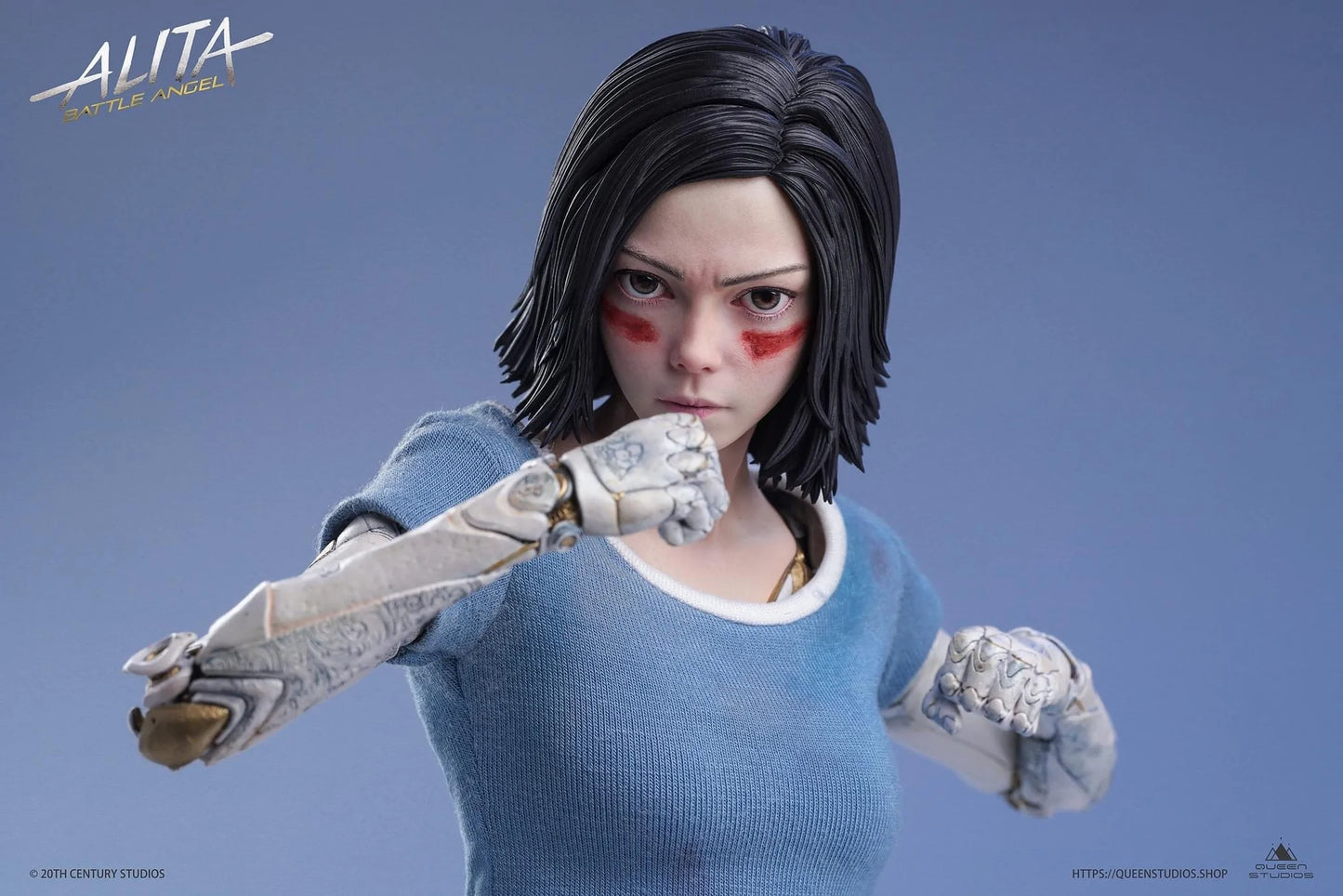 This Queen Studios’ 1/4 scale Alita statue: Battle Angel Stands at 47cm tall. A near perfect scaled down replica of the 1/1 Life-Size statue. Like the life-size statue, her porcelain “doll” body is intricately designed, capturing the unique patterns and clockwork. Her likeness has been recreated with stunning accuracy, and the unique movie inspired base is packed full of detail making this the ultimate collector piece.