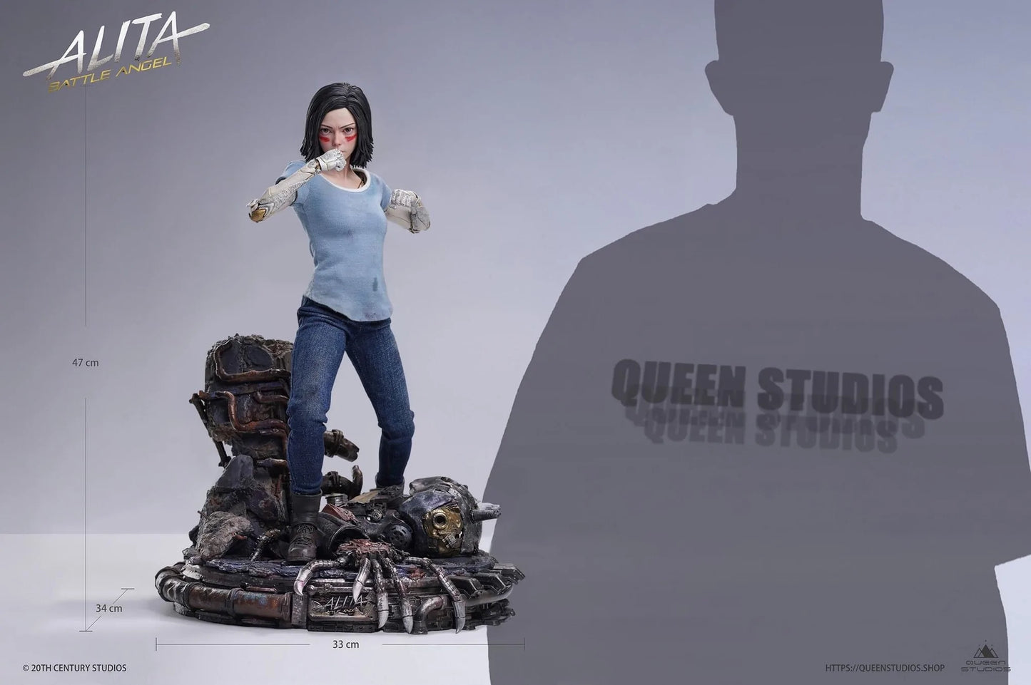 This Queen Studios’ 1/4 scale Alita statue: Battle Angel Stands at 47cm tall. A near perfect scaled down replica of the 1/1 Life-Size statue. Like the life-size statue, her porcelain “doll” body is intricately designed, capturing the unique patterns and clockwork. Her likeness has been recreated with stunning accuracy, and the unique movie inspired base is packed full of detail making this the ultimate collector piece.