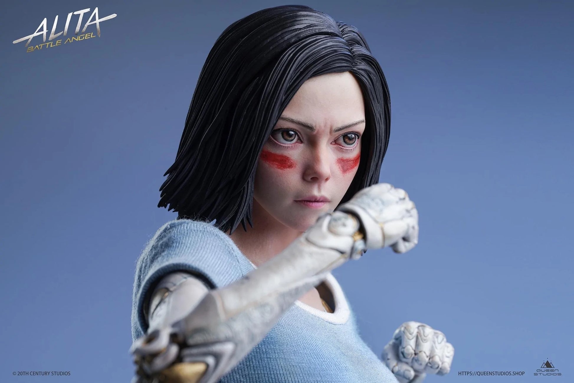 This Queen Studios’ 1/4 scale Alita statue: Battle Angel Stands at 47cm tall. A near perfect scaled down replica of the 1/1 Life-Size statue. Like the life-size statue, her porcelain “doll” body is intricately designed, capturing the unique patterns and clockwork. Her likeness has been recreated with stunning accuracy, and the unique movie inspired base is packed full of detail making this the ultimate collector piece.