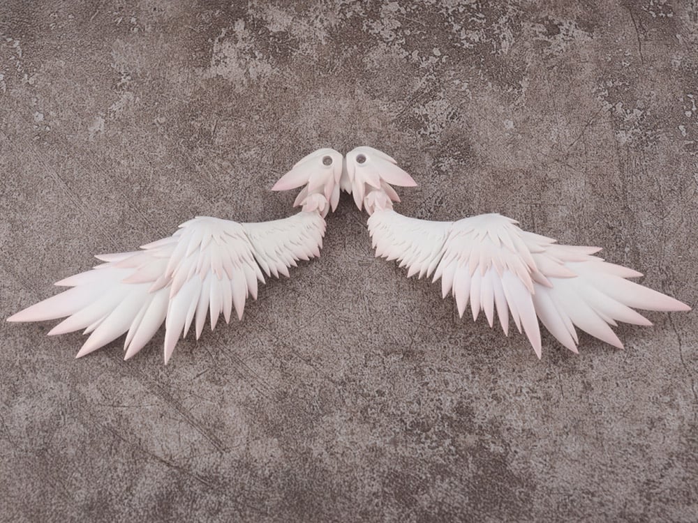Customize your Angel Angela figure with the Angel Angela Sub Wings 1/12 scale accessory set by Snail Shell! This set includes a pair of carefully sculpted secondary wings to be used with the Angel Angela action figure. Be sure to add it to your collection!