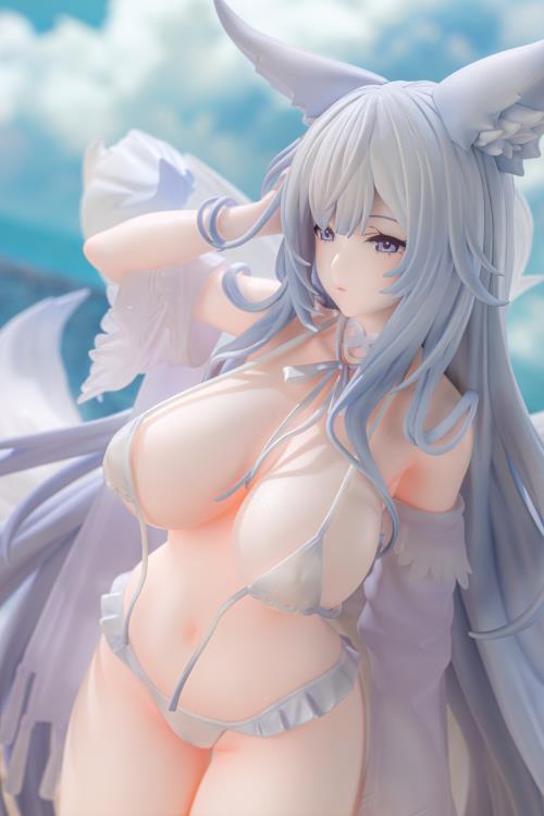 From the Azur Lane video game comes the Shinano (Dreamy White Sands Ver.) 1/6 scale figure by AmiAmi and AniGame! This impressive figure is just under 12 inches tall and displays Shinano in a white bikini that has become undone. Shinano's white fox tails spread out behind as her grey hair drapes down by her knees. Don't miss out on adding this figure to your collection!