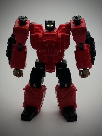 From Fans Hobby comes the Master Builder MB-20 X-Load converting robot. This robot features a red and black color scheme and can convert into a vehicle. This highly detailed X-Load figure is a terrific addition to any collection.