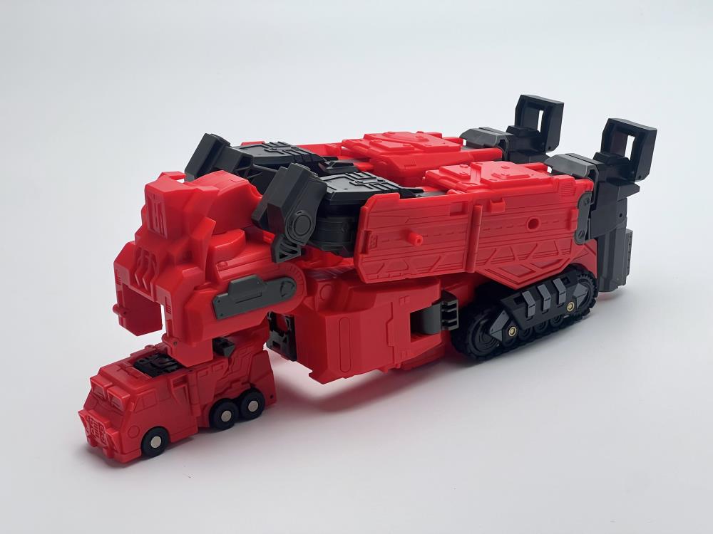 From Fans Hobby comes the Master Builder MB-20 X-Load converting robot. This robot features a red and black color scheme and can convert into a vehicle. This highly detailed X-Load figure is a terrific addition to any collection.