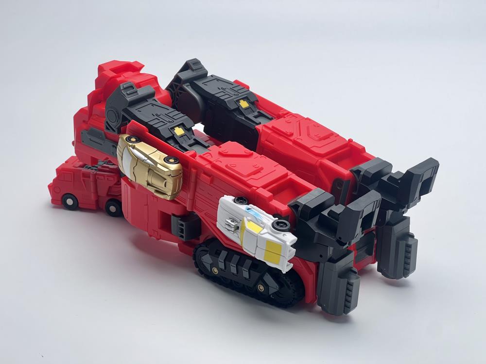 From Fans Hobby comes the Master Builder MB-20 X-Load converting robot. This robot features a red and black color scheme and can convert into a vehicle. This highly detailed X-Load figure is a terrific addition to any collection.