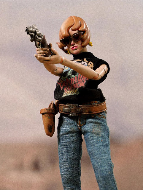 Embrace your rebellious side with this Canyon Sisters Mrs. T figure! This figure features premium articulation and includes custom fabric clothing for a more authenctic look.