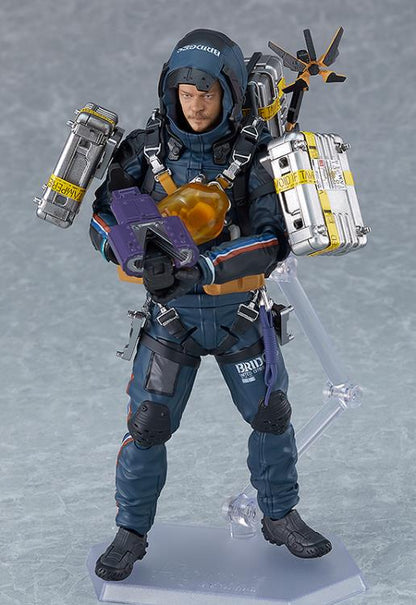 Supervised entirely by Kojima Productions, the popular game Death Stranding releases the deluxe version of the Sam Porter Bridges figma!  The smooth yet poseable joints of figma figures allow them to be posed on their included articulated stand. 3D paintwork has been utilized to realistically recreate Sam's face. He comes with a small cargo case, an assault rifle, damage sensor tape, and cargo ID stickers that can be applied as desired.