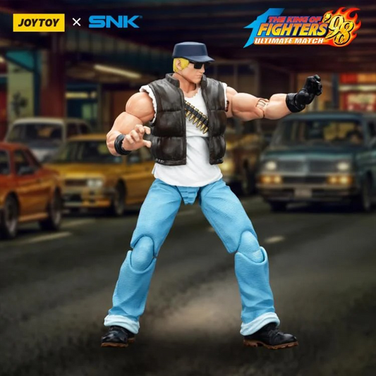 A new fighter is approaching! From the legendary fighting game The King of Fighters '98: Ultimate Match comes the next challenger in 1/18 scale: Clark Still! Dressed in his traditional black and white outfit, Clark comes with a large variety of accessories including effect pieces when he executes a powerful move. Recreated with outstanding detail lifted directly from the game, you'll be able to re-enact your favorite brawls or envision your own high stakes fights in style!