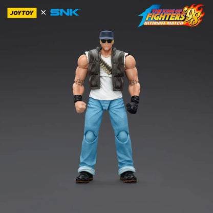 A new fighter is approaching! From the legendary fighting game The King of Fighters '98: Ultimate Match comes the next challenger in 1/18 scale: Clark Still! Dressed in his traditional black and white outfit, Clark comes with a large variety of accessories including effect pieces when he executes a powerful move. Recreated with outstanding detail lifted directly from the game, you'll be able to re-enact your favorite brawls or envision your own high stakes fights in style!