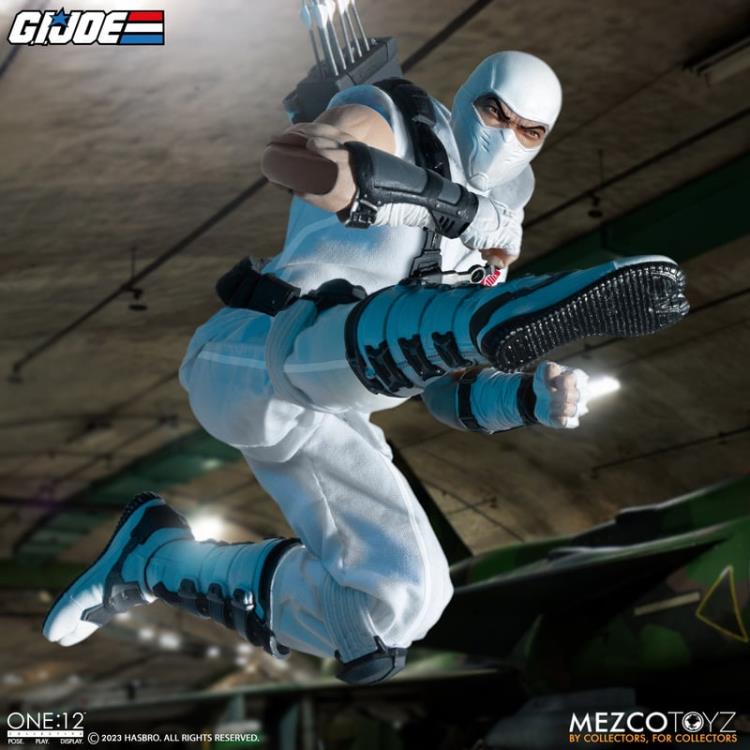 Enter Storm Shadow, Cobra Commander’s ninja bodyguard and latest addition to the One:12 Collective! The One:12 Collective Storm Shadow is outfitted in a short-sleeved karategi with Cobra insignia, shin guards, and tabi boots. His chest harness can hold 3 kunai in the front and his quiver in the back, and his thigh sheath can hold his nunchaku. Storm Shadow comes complete with two masked head portraits with different facial expressions, and 1 unmasked portrait.