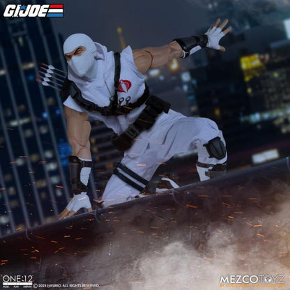 Enter Storm Shadow, Cobra Commander’s ninja bodyguard and latest addition to the One:12 Collective! The One:12 Collective Storm Shadow is outfitted in a short-sleeved karategi with Cobra insignia, shin guards, and tabi boots. His chest harness can hold 3 kunai in the front and his quiver in the back, and his thigh sheath can hold his nunchaku. Storm Shadow comes complete with two masked head portraits with different facial expressions, and 1 unmasked portrait.